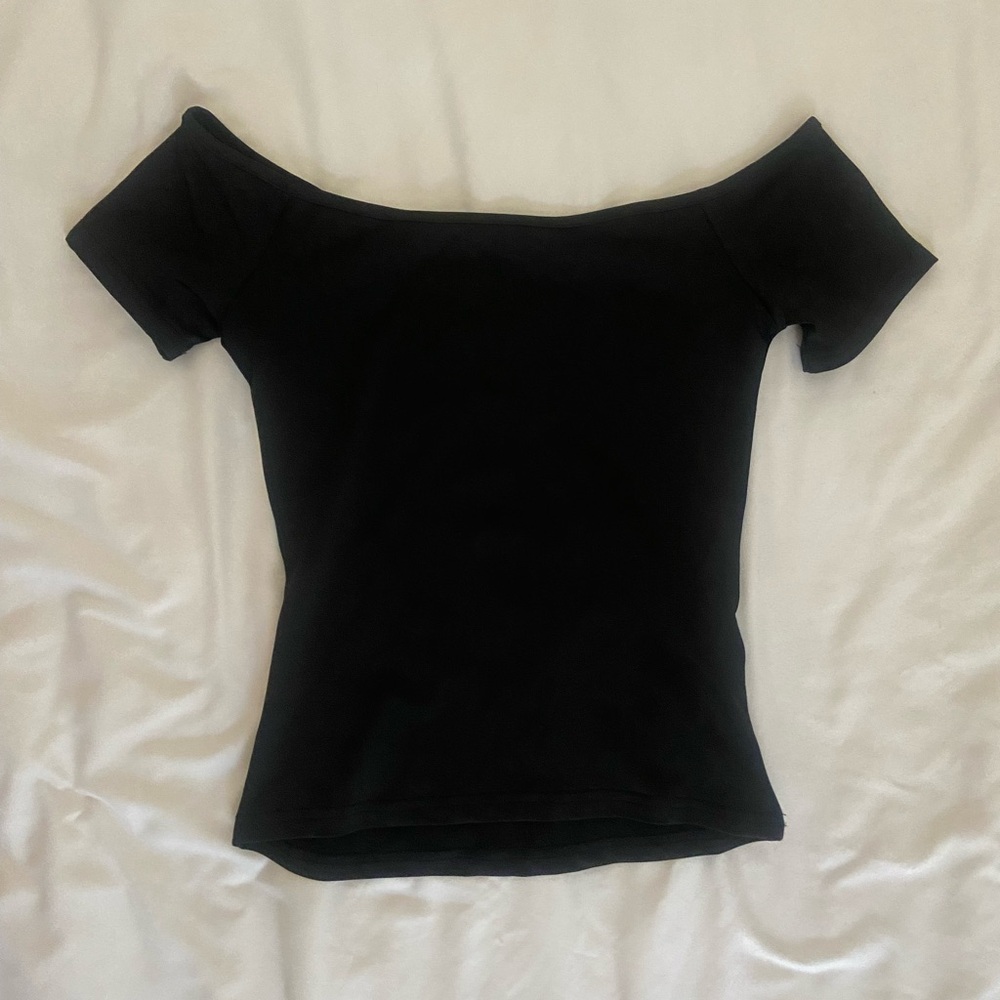 Form fitting off the shoulder black top